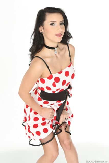 Nelly Kent XXXBios - Hot brunette Romanian pornstar Nelly Kent in sexy white and red polkadot dress and black high heels - Rocco's Dirty Girls 6 Evil Angel Nelly Kent porn pics sfw