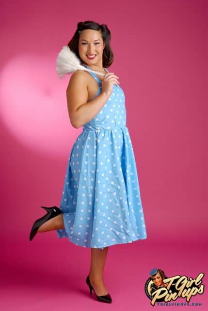 Khloe Hart XXXBios - TS Khloe Hart sexy 50s pinup girl outfit, white and blue polka dot dress and black high heels with white feather duster - TGirl Pinups Khloe Hart porn pics sfw