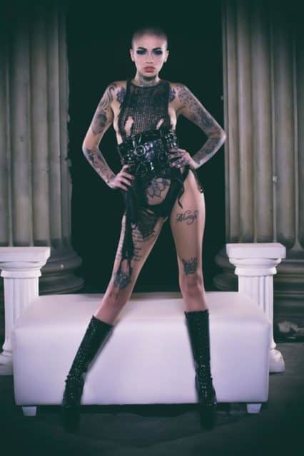 Leigh Raven XXXBios - Hot petite tattooed pornstar Leigh Raven in sexy black ripped dress with black panties and knee high leather latex PVC boots - Fallen 2 Angels And Demons Wicked Pictures Leigh Raven porn pics sfw