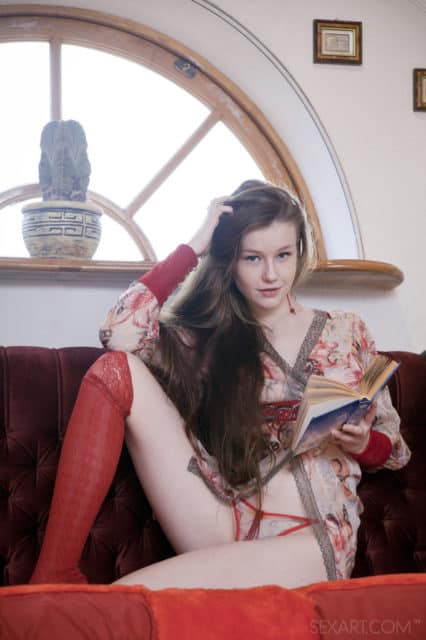 Emily Bloom in sexy floral robe, red and white lingerie and red knee high socks - XXXBios European porn pics
