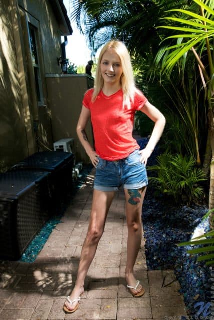 Kate Bloom XXXBios - Hot blonde petite new teen pornstar Kate Bloom in sexy red top, denim booty shorts, white flip flops and barefeet - Nubiles.net Kate Bloom porn pics sfw