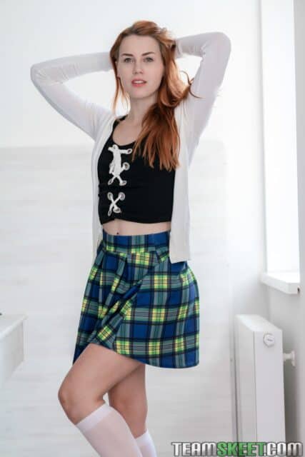 Charlie Red XXXBios - Hot all natural redhead Czech pornstar Charlie Red in sexy schoolgirl outfit with black top, white sweater cardigan, white knee high socks and blue tartan skirt - Teen Pies Team Skeet Charlie Red porn pics sfw