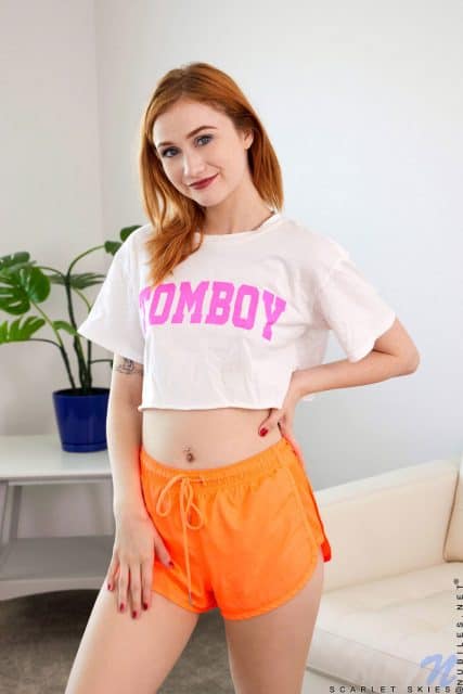 Scarlet Skies XXXBios - Hot petite all natural redhead pornstar Scarlet Skies in sexy white and pink tshirt with 'Tomboy' written on it and orange booty shorts - Nubiles.net Scarlet Skies porn pics sfw