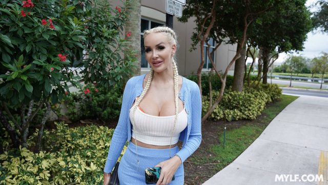 Blondie Bombshell XXXBios - Hottest tall busty blonde German MILF pornstar Blondie Bombshell aka Blondie Banks shows off her 32DD big tits and big ass bubble butt booty in sexy white vest top, blue sweater cardigan and matching blue pants with high heels - MYLF Blondie Bombshell porn pics sfw