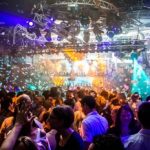Party rave scene on the dancefloor at a nightclub in Eindhoven